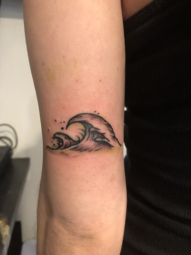 Explore simple line tattoo ideas, creative tattoo ideas in Winter Park, available at Black Pine Tattoo