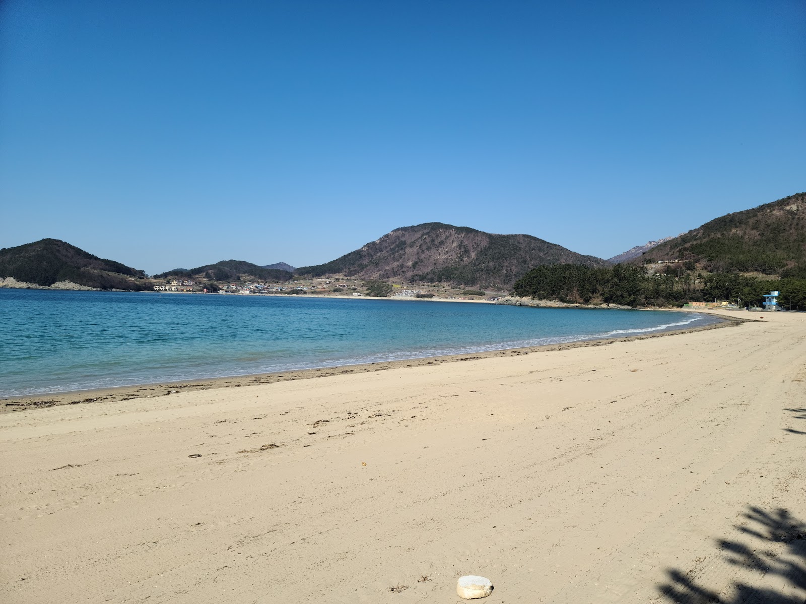 Sangju Solbaram Beach'in fotoğrafı parlak kum yüzey ile