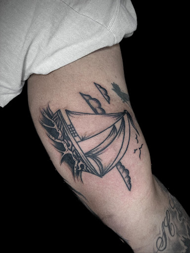 Explore tattoos inner bicep ideas, creative tattoo ideas in Johnson City, available at Gold Cross Tattoo Co.