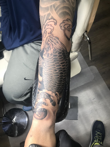 Explore spine tattoo ideas male, creative tattoo ideas in Lake Charles, available at Brand-X Tattoo & Piercing