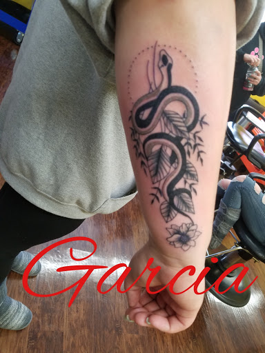 Explore arm filler tattoo ideas, creative tattoo ideas in Kearney, available at Ink Shop Tattoos & Piercings