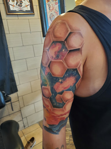 Explore peacock feather tattoo ideas, creative tattoo ideas in Albuquerque, available at Relic Tattoo Co.