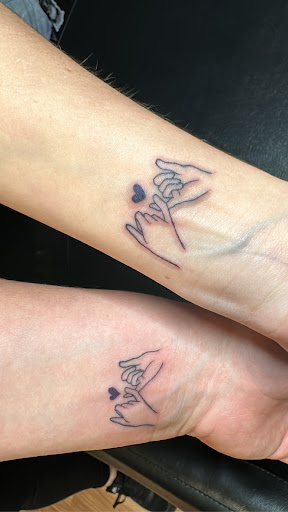 Explore flower spine tattoo ideas, creative tattoo ideas in Williamsport, available at Tats Tattoo Zoo