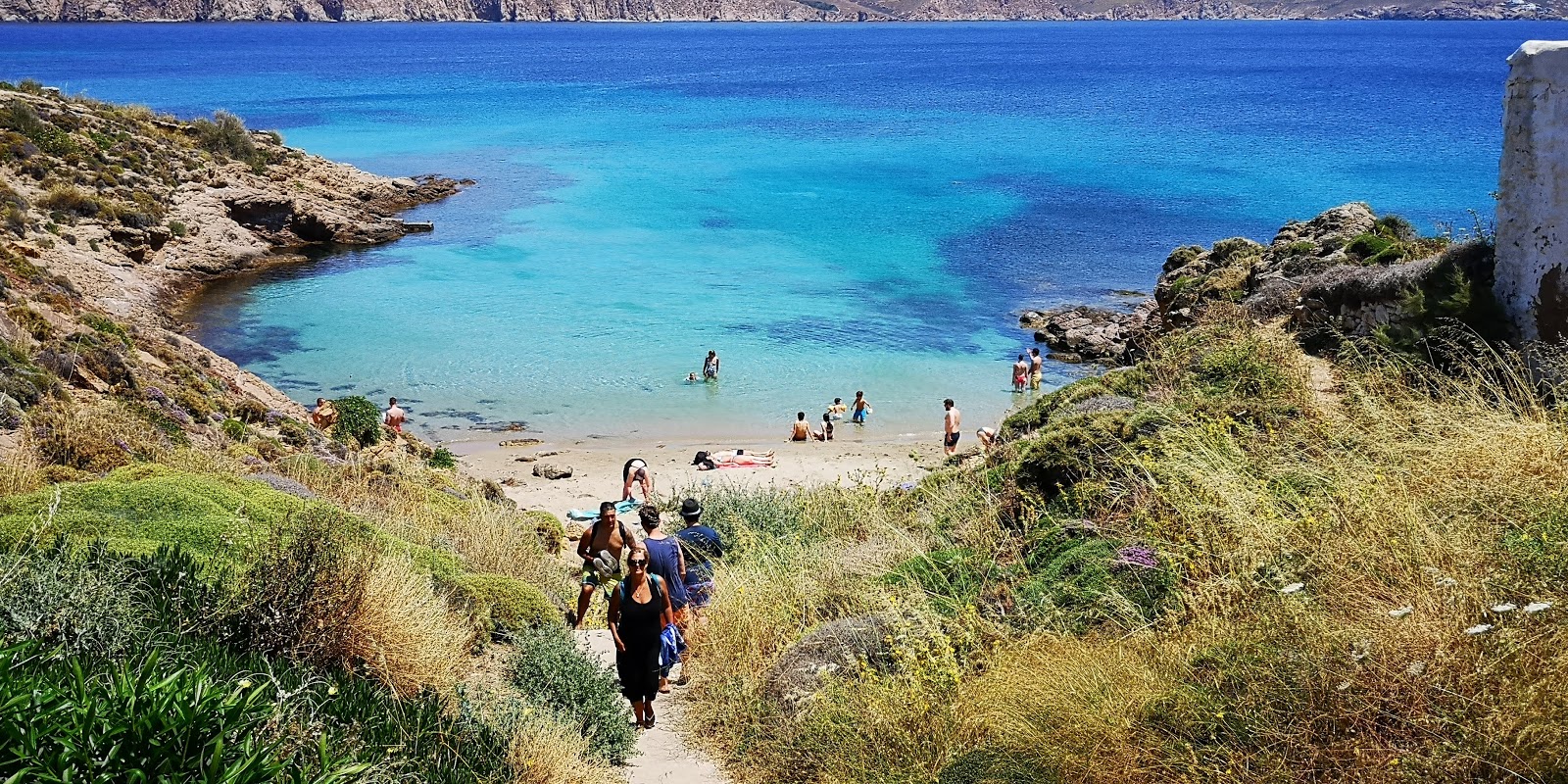 Foto van Lovers beach met turquoise puur water oppervlakte