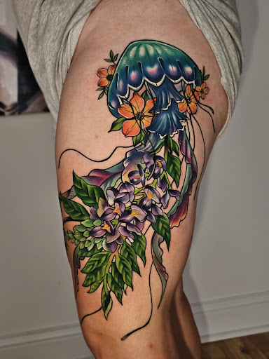 Explore female sleeve tattoos ideas, creative tattoo ideas in Kansas City, available at Golden Stag Tattoo and Gallery