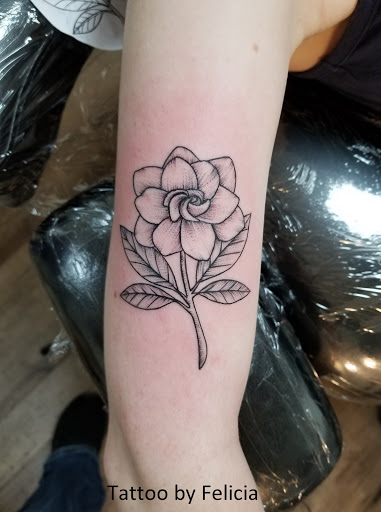 Explore matching tattoos for father and son ideas, creative tattoo ideas in Fort Myers, available at Tiger Lotus Tattoo and Piercing