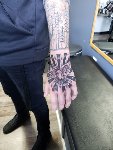 Tattoo Shop «Next Level Tattoo Company - Imlay City», reviews and photos, 420 E 3rd St, Imlay City, MI 48444, USA