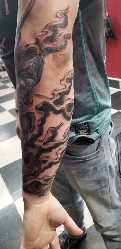 Explore traditional tattoo sleeve ideas, creative tattoo ideas in Du Bois, available at Primitive Addiction Tattoo Studio
