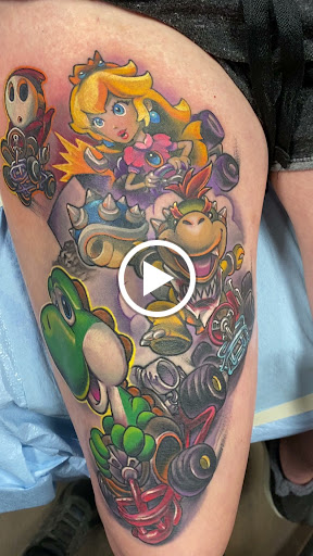 Explore tombstone movie tattoo ideas, creative tattoo ideas in Minot, available at 2D INK