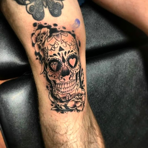 Explore gun tattoo ideas, creative tattoo ideas in Atlantic Beach, available at The Ink Chamber Tattoo Parlor