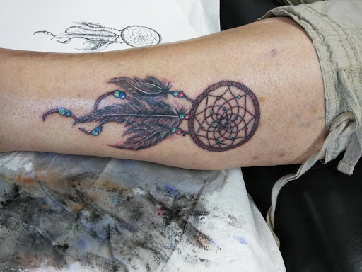 Explore book dragon tattoo ideas, creative tattoo ideas in Albuquerque, available at Tattoosbyfrankieg