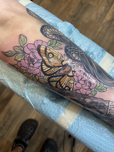 Explore black and white tattoo ideas, creative tattoo ideas in Ocala, available at The Black Sheep Tattoo Shop