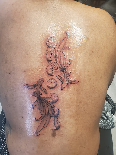 Explore awesome finger tattoo ideas, creative tattoo ideas in Bronx, available at Living Legends Ink realistic tattoos