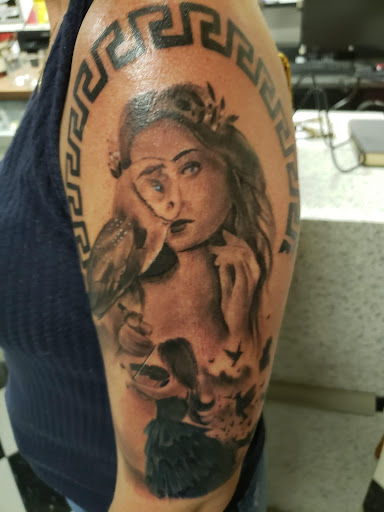 Explore dog love tattoo ideas, creative tattoo ideas in Savannah, available at Tatlyfe Studios