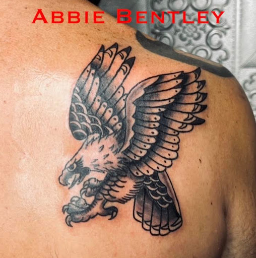 Explore snoopy tattoo ideas, creative tattoo ideas in Bristol, available at Utopia Tattoo, Piercing and PMU