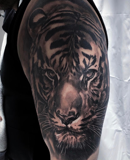 Explore mom & son tattoo ideas, creative tattoo ideas in Bronx, available at Anarchy Tattoo Studios