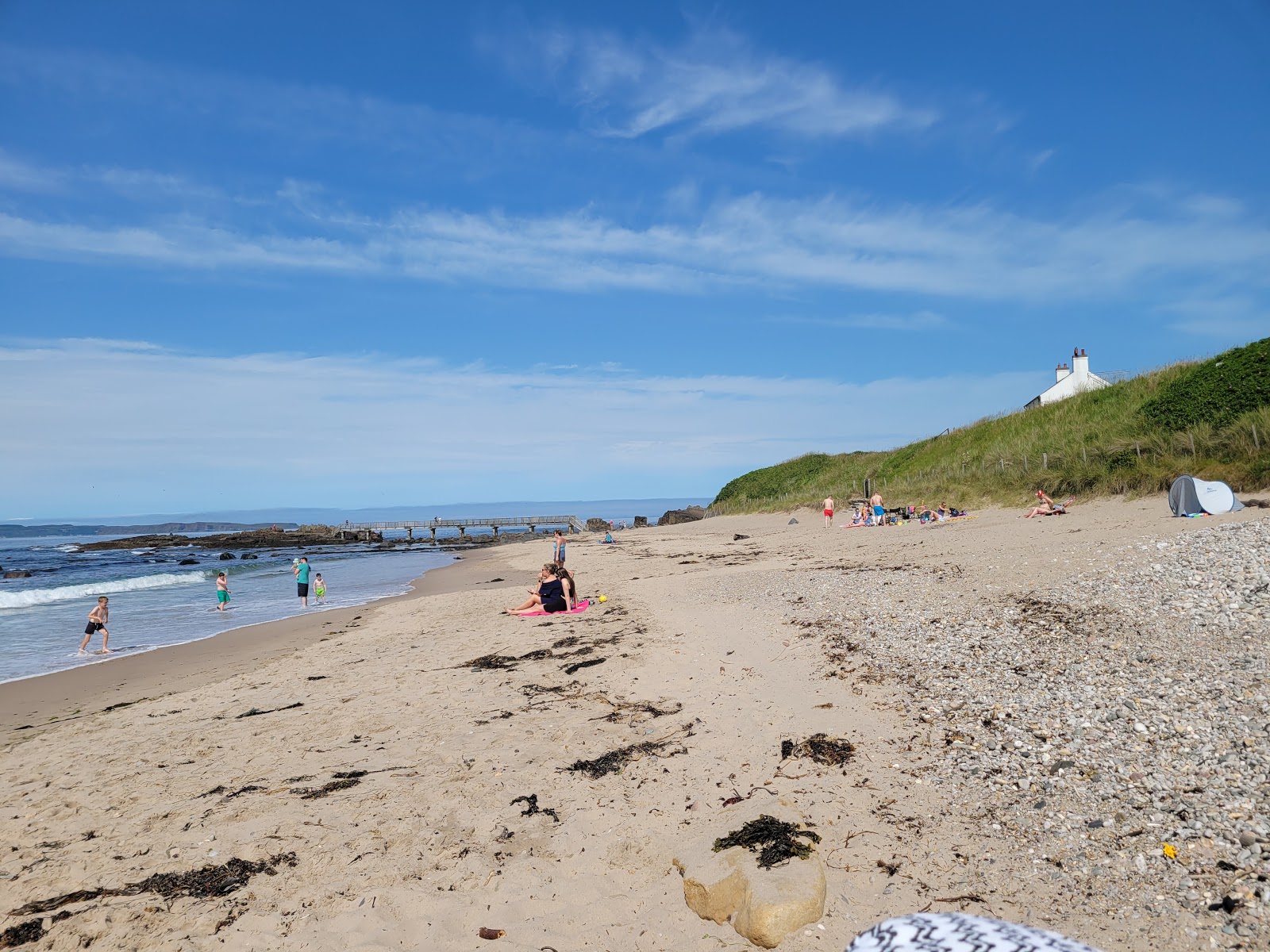 Fotografija Ballycastle Beach z dolga ravna obala