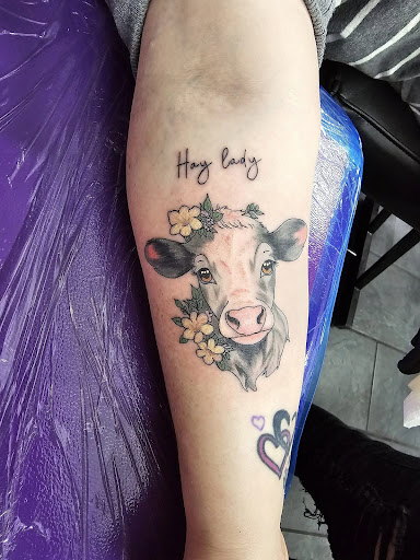 Explore book lover tattoo ideas, creative tattoo ideas in Cadillac, available at Warchief Tattoo, LLC