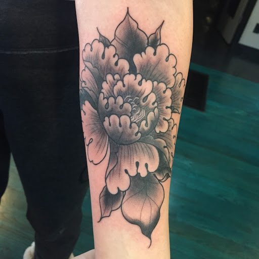 Explore forearm sleeve tattoo ideas for men, creative tattoo ideas in Reno, available at Aces Tattoo