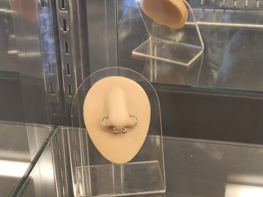 Explore batman logo tattoo ideas, creative tattoo ideas in Kokomo, available at New Breed