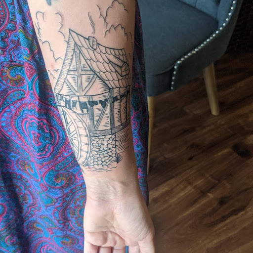 Explore family tattoo sleeve ideas, creative tattoo ideas in Lawrence, available at Standard Electric Tattooing