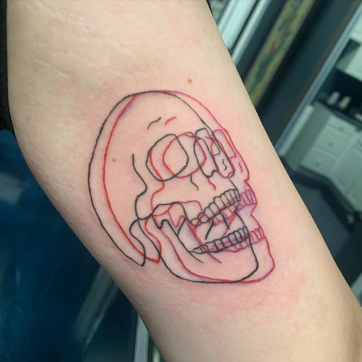 Explore skull tattoo cover up ideas, creative tattoo ideas in Buford, available at Inked Arts Tattoo Studio