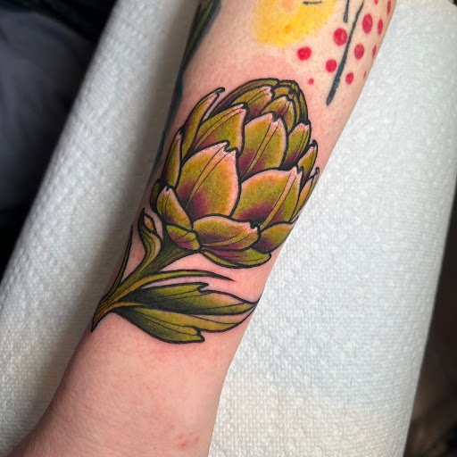 Explore mens tattoo wedding ring ideas, creative tattoo ideas in Des Moines, available at Iron Heart Tattoo