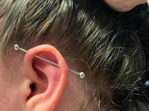 Explore tattoo ideas for athletes, creative tattoo ideas in Dover, available at Walls of Wonder Tattoo And Body Piercing