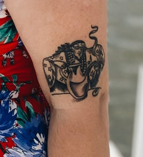 Explore knee cap tattoo ideas, creative tattoo ideas in Bradley, available at Electric Lady Lounge