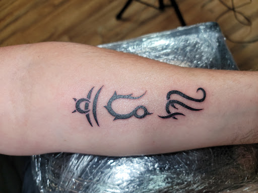 Explore birth flower tattoos ideas, creative tattoo ideas in Venice, available at Ministry of Ink Tattoo & Piercing