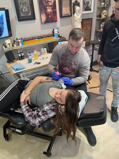 Explore crown tattoo ideas for guys, creative tattoo ideas in Fort Wayne, available at Grade A Tattoos and Body Piercing