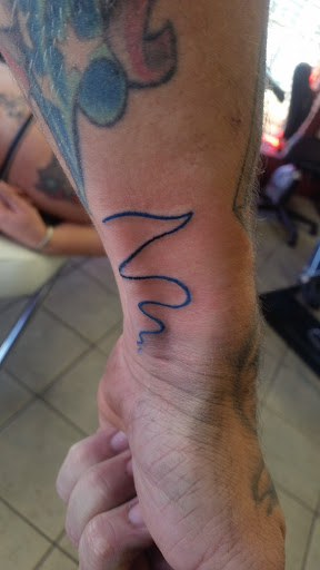 Explore arm florida tattoo ideas, creative tattoo ideas in Osage Beach, available at Sweet Ink Tattoo