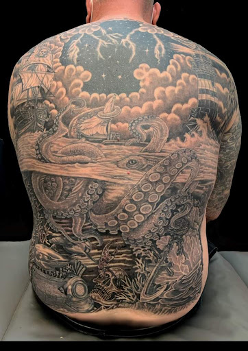 Explore world map tattoo ideas, creative tattoo ideas in Georgetown, available at Body Art Tattoos