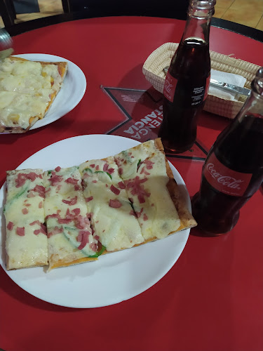 Pizzeria y Parrilladas " EL LEÑADOR " La Luz - Quito