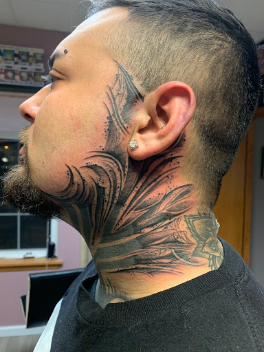 Explore red cardinal tattoo ideas, creative tattoo ideas in Kenosha, available at Kenosha Tattoo Company