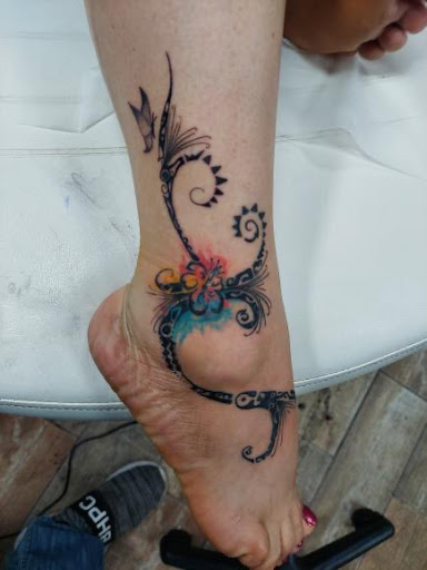 Explore queen of spades tattoo ideas, creative tattoo ideas in Buford, available at Wild Tribe Tattoos and Piercings