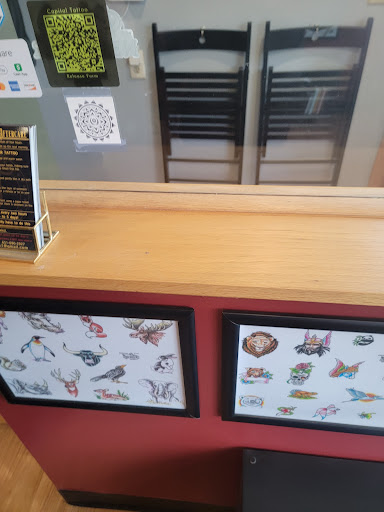 Explore black and white sleeve tattoo ideas, creative tattoo ideas in Saint Paul, available at Capital Tattoo