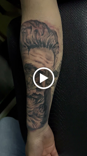 Explore treble clef tattoo ideas, creative tattoo ideas in Lakeville, available at Savage Ink