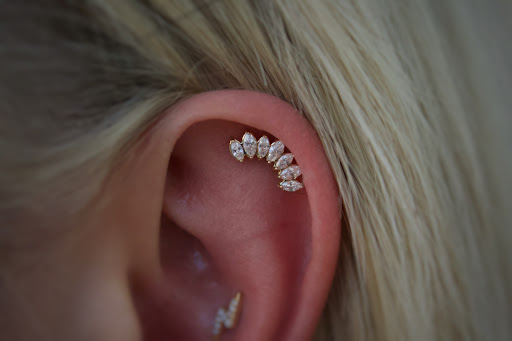 Explore airborne tattoo ideas, creative tattoo ideas in Corona Del Mar, available at Rainbow Piercing & Jewelry