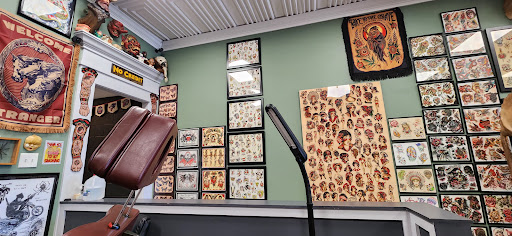 Explore tattoo ideas for females on hips, creative tattoo ideas in Medina, available at Scapegoat Tattoos