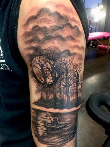 Explore lower back tattoo cover up ideas, creative tattoo ideas in Poplar Bluff, available at MEink