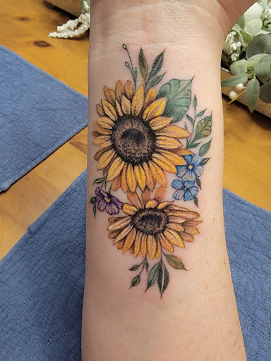 Explore son's name tattoo ideas, creative tattoo ideas in Bethpage, available at Village Tattoo