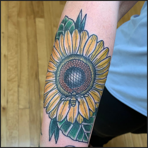 Explore back of arm tattoo ideas, creative tattoo ideas in Minneapolis, available at Nokomis Tattoo