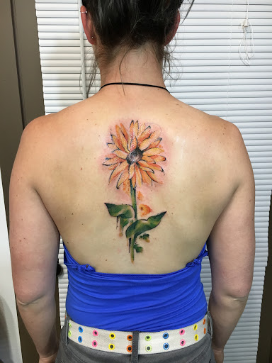 Explore cross tattoo ideas for men, creative tattoo ideas in Portland, available at Obsidian Tattoo