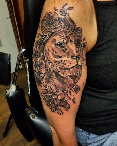Find tattoo business card ideas for your next unique tattoo in Cumberland at Queen City Ink