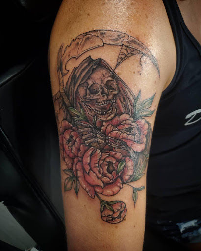 Explore son tattoo ideas, creative tattoo ideas in Palm Harbor, available at Angry Owl Tattoo and Piercing