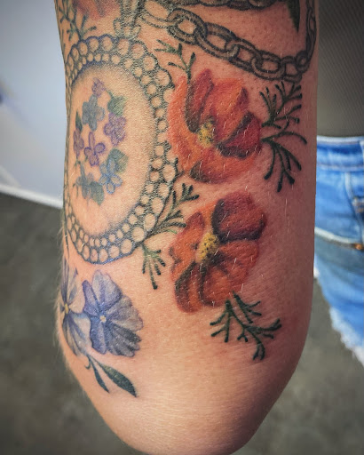 Explore father and son matching tattoo ideas, creative tattoo ideas in Connellsville, available at Sugar Hill Tattoo Studio