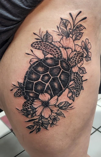 Explore small hand tattoo ideas, creative tattoo ideas in Grand Ledge, available at Van Gogh Tattoos