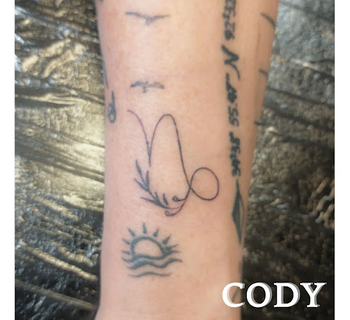 Explore wall-e tattoo ideas, creative tattoo ideas in Benton, available at Relics Tattoo Studio