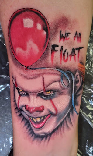 Explore italian horn tattoo ideas, creative tattoo ideas in Angola, available at Hoodlum Ink